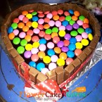 send Order500gms Heart Shape KitKat Gems Chocolate Cake Delivery