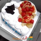 send 1kg eggless heart shaped fruit cake  delivery