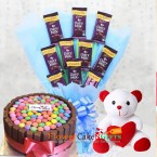 send 1kg kitkat gems cake n teddy chocolate bouquet delivery
