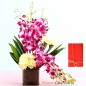 yellow carnations orchids in vase