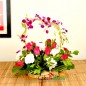 8 pink roses 8 white carnations 2 purple orchids in a basket