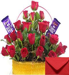 Basket Arrangement of Red Roses n Cadbury Dairy Milk Chocolates 