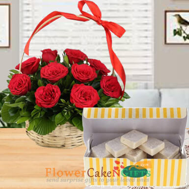 15 red roses basket and half kg kaju barfi sweets