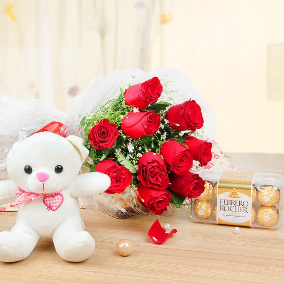 10 red colored roses teddy n box of 16 ferrero rocher chocolates