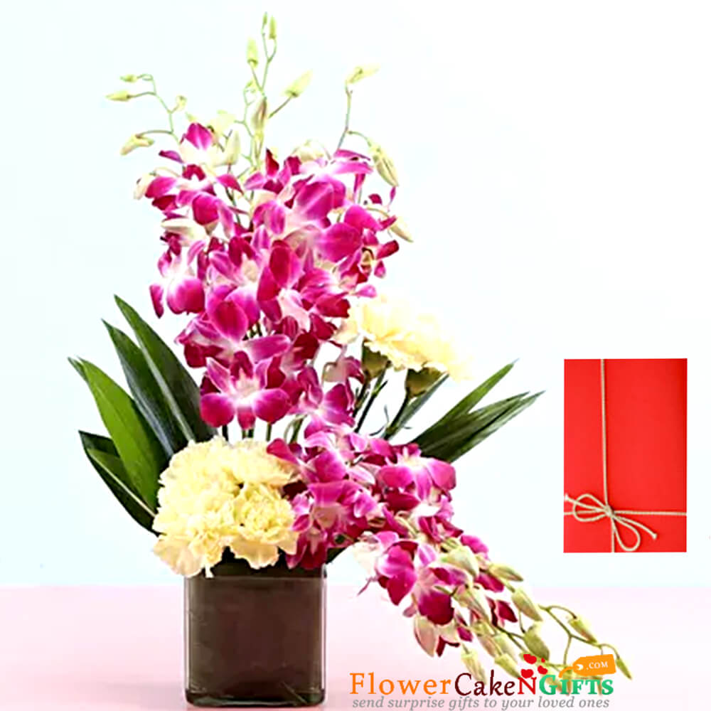 yellow carnations orchids in vase