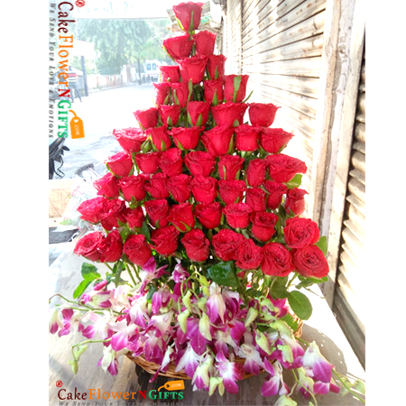 55 roses 6 purple orchids flower basket