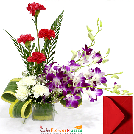 4 purple orchids 8 red n white carnations vase and card